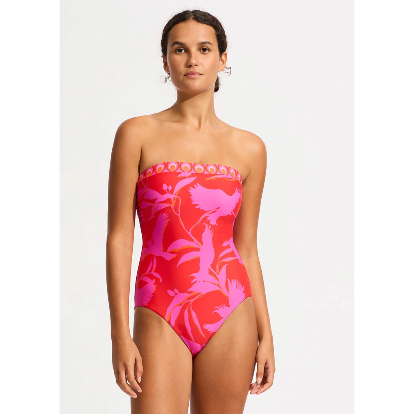 Bandeau style swimsuit with grip across the top to help hold in place, bikni legline to flatter body