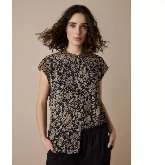 lightly padded shoulder cap sleeve blouse. black background with a vintage look floral design 