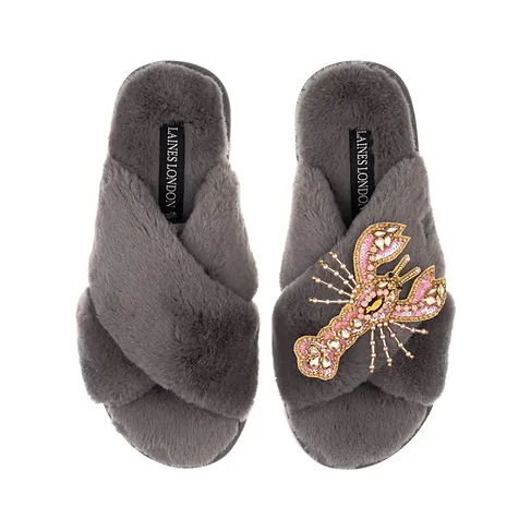 grey faux fur slippers with front cross design snd removablr ppink loster brooch